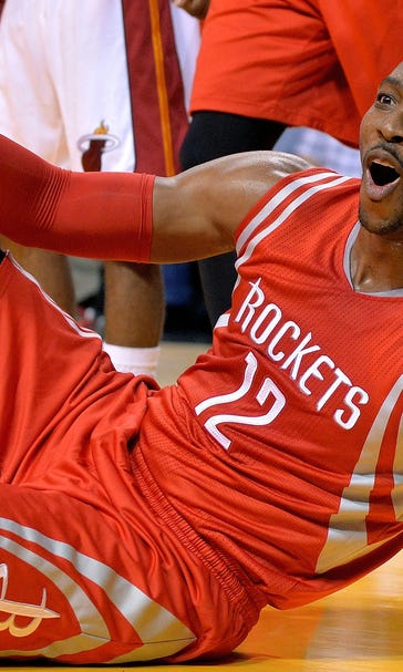 Wade leads late charge, Heat top Rockets